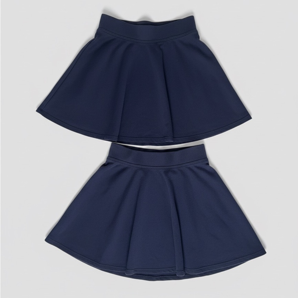 Bundle of 2 The children’s Place girls school navy skorts 5/6